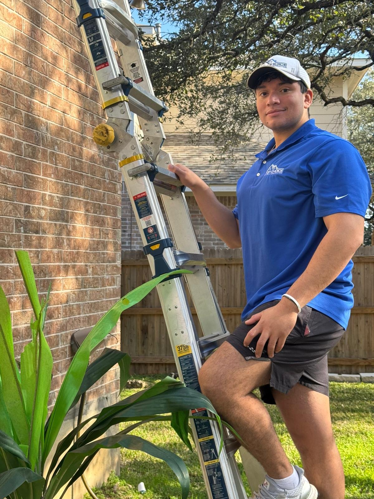 Top Choice Roofing inspector conducting a thorough roof assessment